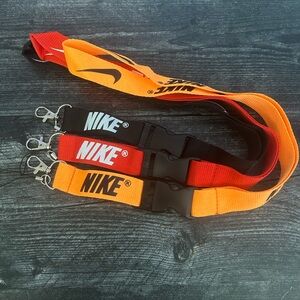Nike Orange, Red, and Black Lanyard Trio